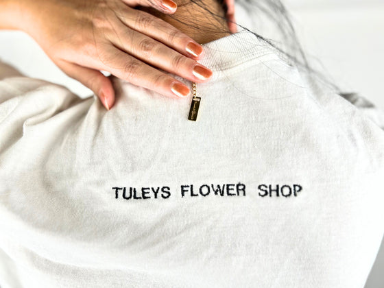 Tuley's Flowershop "What in Carnation" T-Shirt