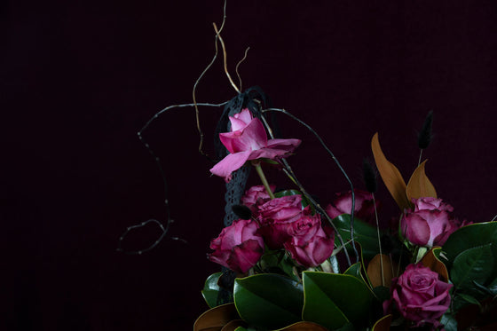 Dozen Roses In A Vase